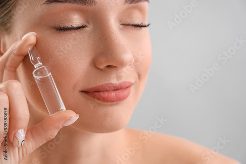 Beautiful young woman with ...