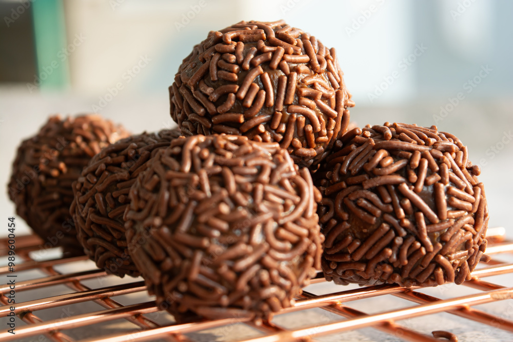 Close-up of chocolate brigadeiros, a Brazilian dessert. Close-up of chocolate brigadeiros, a Brazilian dessert.