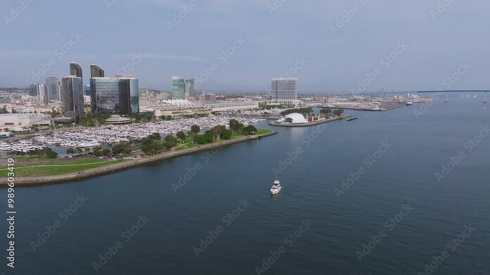 Aerial view of the scenic San Diego downtown financial district city skyline and skyscrapers. Marriott Marina and Convention Center at San Diego Bay. Aerial view of the scenic San Diego downtown financial district city skyline and skyscrapers. Marriott Marina and Convention Center at San Diego Bay.