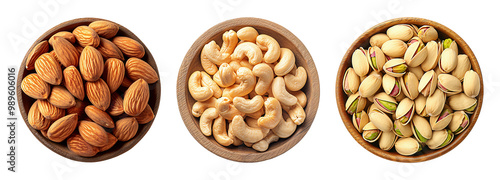 Almonds cashews and pistachios fill wooden bowls showcasing their diverse shapes and natural colors