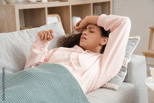 Sick African-American woman...