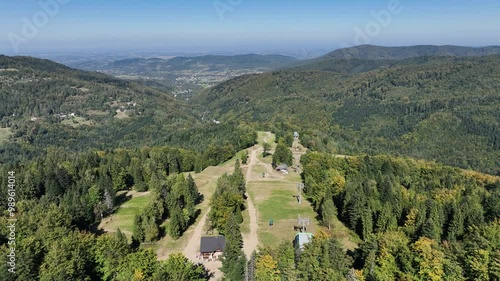 Beskid Maly aerial panorama of potrojna hill and czarny gron.Little Beskids mountain range.Aerial drone view of Rzyki Village in Beskid Maly Poland.Czarny gron ski resort in Rzyki, Andrychow, Poland. photo