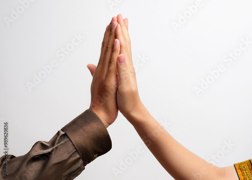 two hands high-fiving