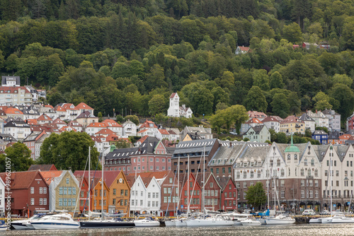 Ancient Colorful Wooden Buildings in the Bryggen Wharf Area, Bergen, Norway as Seen from the Nordnes Peninsula Across the Harbor photo