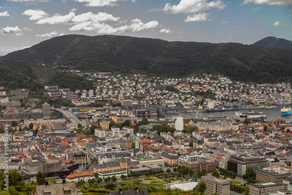 Naklejka premium View of the City and Mountains surrounding Bergen Norway on a Summer Day from Atop Mount Fløyen at the Fløibanen Funicular Station