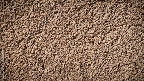 A highly detailed natural texture with earthy brown tones, featuring a grainy, stone-like surface. Perfect for realistic backgrounds, wallpapers, and design elements