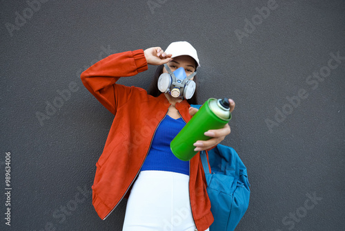 Young woman in respirator w...