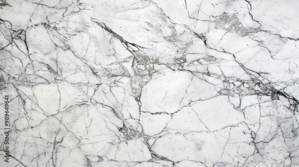 A minimalist white marble background with delicate grey veins, ideal for clean and modern design projects A minimalist white marble background with delicate grey veins, ideal for clean and modern design projects