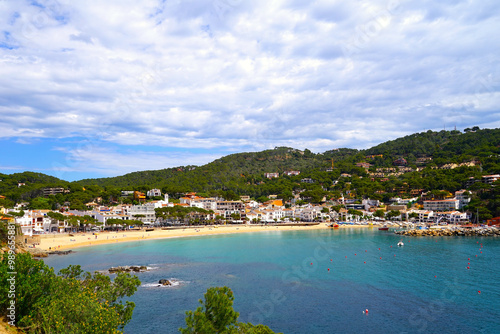 view to beautiful bay with beach and promenade of the village Llafranc seen from the Camí de Ronda, Costa Brava, Girona, Catalonia, Spain