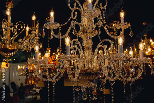 Wallpaper Mural Luxury chandelier in lighting store on a dark background Torontodigital.ca