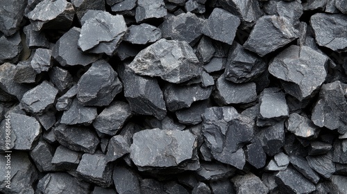 A Close Up of a Pile of Rough, Gray and Black Rocks, Perfectly Representing the Texture of a Rugged and Untamed Landscape