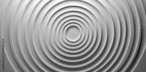 Close-up of a textured, abstract concentric oval spiral design in grayscale.