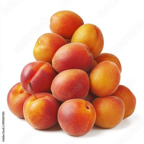 An apricot fruit isolated on a white background with a green leaf in the background