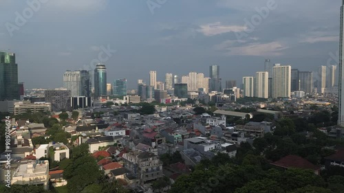 magnificent skyscrapers such as office buildings, hotels and towering apartments with modern and futuristic architecture. 4K Drone aerial buildings in Jakarta