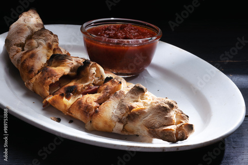 Obraz na płótnie italian stromboli, pizza arrotolata w salonie