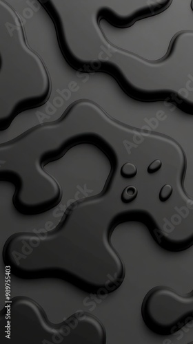 Textured black surface with organic shapes resembling camouflage patterns. photo