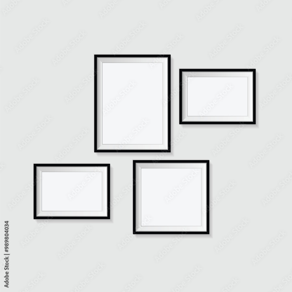Isolated against a wall, a blank picture frame template set Isolated against a wall, a blank picture frame template set