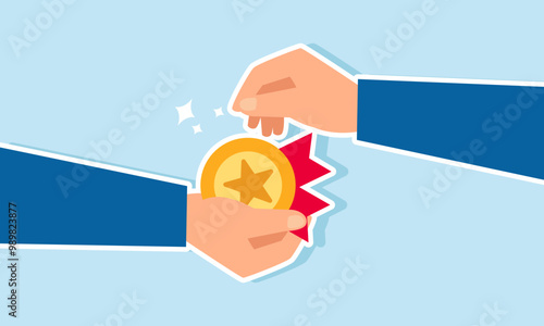 A businessman hand giving an award medal to another hand, illustrating giving recognition for an employee achievement
