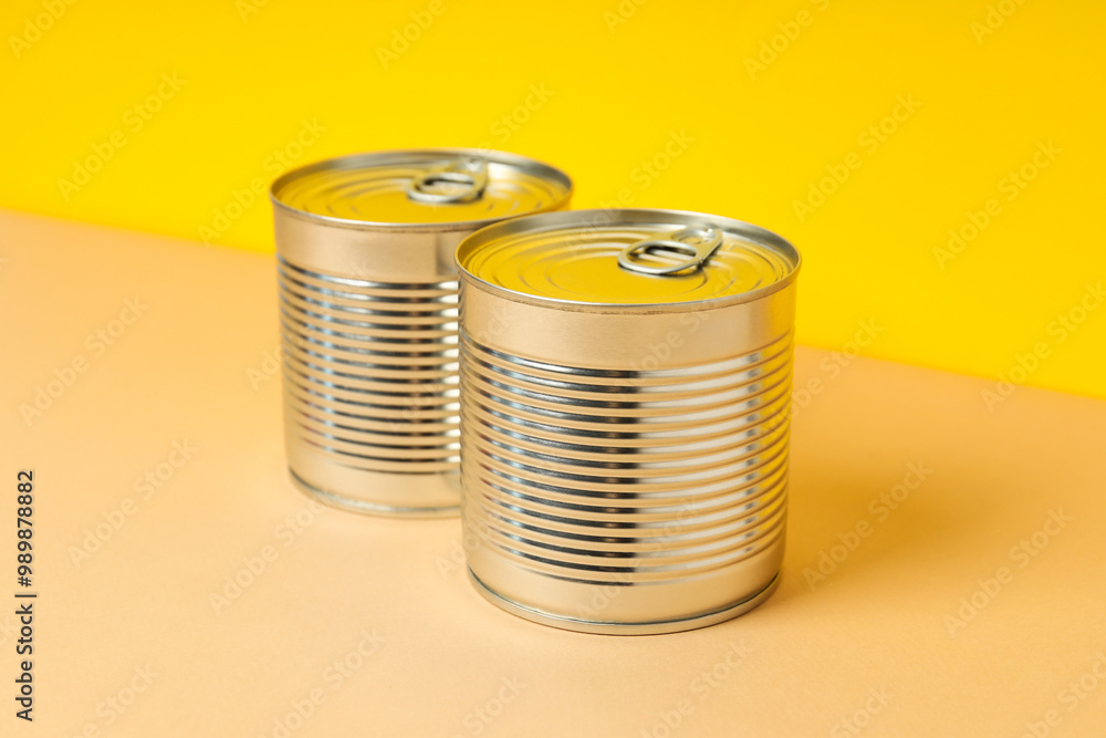 Can with food, on a yellow background. Can with food, on a yellow background.