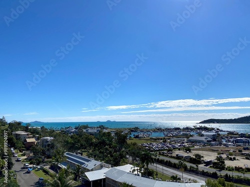 View of a town with the ocean and blue sky on the background