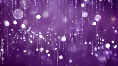 Abstract purple background with vertical shimmering light streaks and bokeh effects. Festive and glamorous concept. 4K background material for loop playback