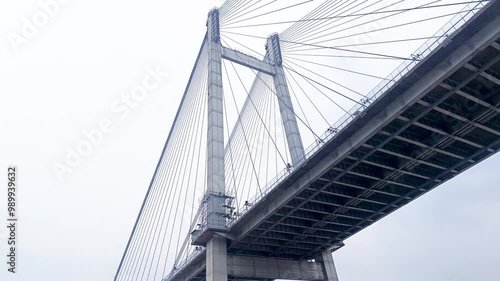 Vidyasagar setu or Vidyasagar bridge of Kolkata city shot from below while moving under it. This bridge is symbolic to metro city Kolkata and west bengal.