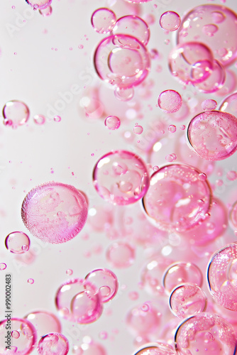  Delicate pink bubbles adorning a soft white background for modern aesthetic photo