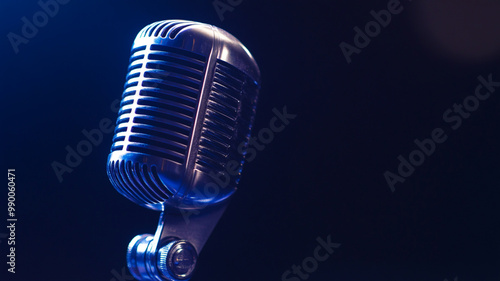 Classic microphone against a dark background showcasing vintage design and detailed craftsmanship
