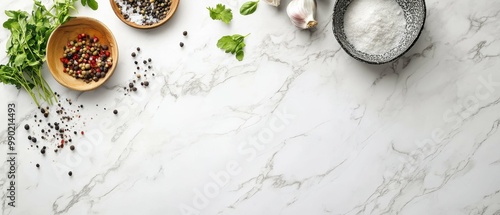 Spices and herbs on marble countertop. photo