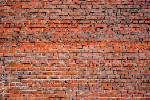 Red brick wall backgrounds. Old brickwork texture. Rock block pattern. Vintage stonewall. Abstract grunge urban design. Textured surface building.