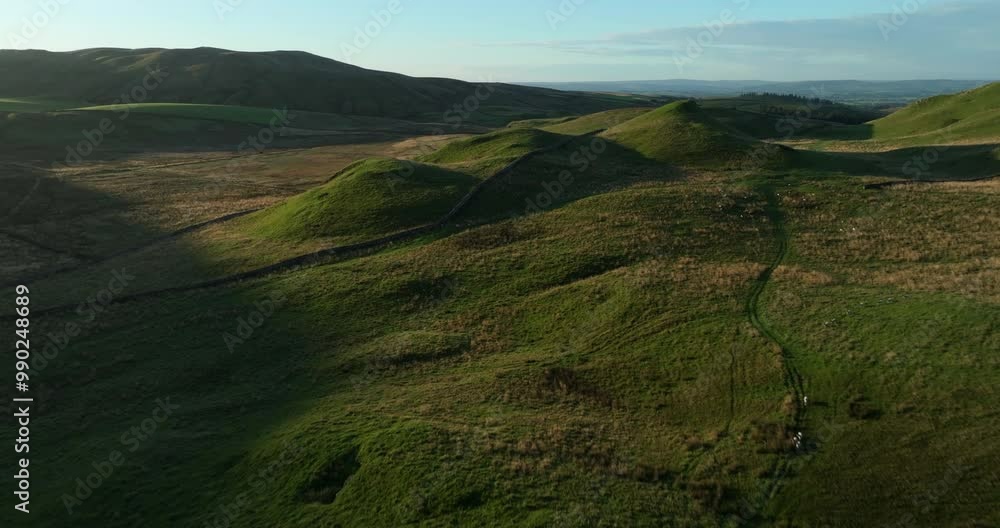 Flying above green hills in Yorkshire Dales Flying above green hills in Yorkshire Dales