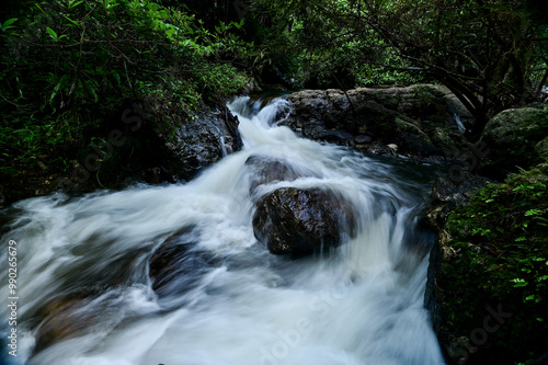 A small waterfall created from water flowing from Khlong Lan Waterfall. In Namtok Khlong Lan National Park Kamphaeng Phet Province