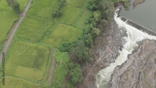 Raw footage Aerial view of river with Dam near agriculture field Located in Mayadevi Temple in Dang Gujarat.   photo