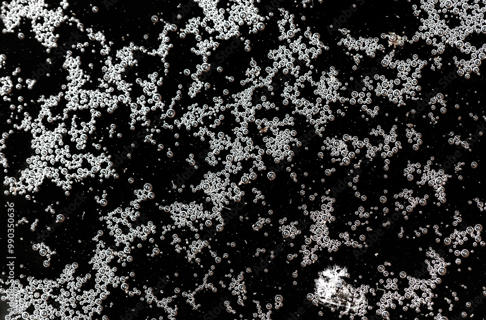 Balls of air on the surface of the water as a background. Macro Balls of air on the surface of the water as a background. Macro