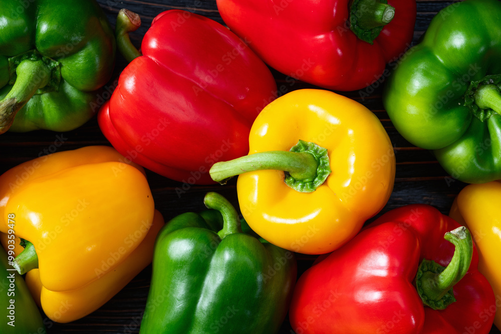 Fresh sweet bell pepper ( paprika ) photography red , green and yellow . Colorful vegetable . Top view Fresh sweet bell pepper ( paprika ) photography red , green and yellow . Colorful vegetable . Top view