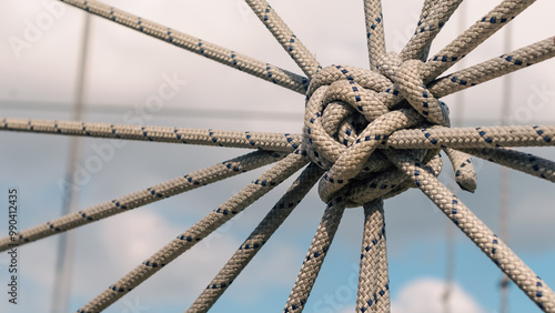 many ropes and one big knot close up photo