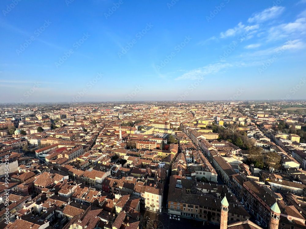 Fototapeta premium Cremona panorama of the cities seen from the Torrazzo tower at sunset. High quality photo