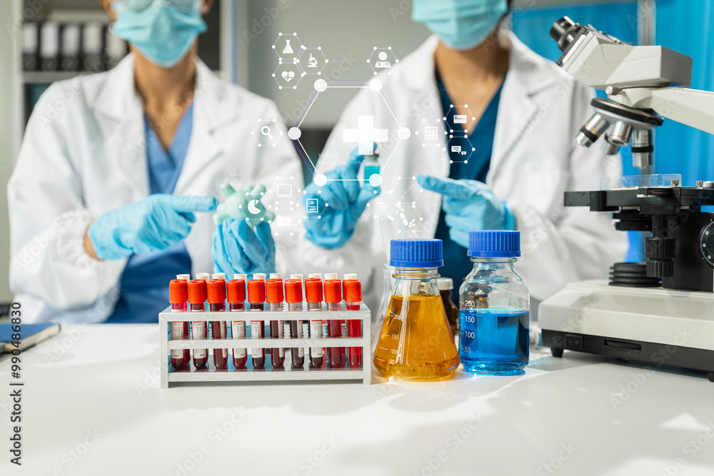 Fototapeta premium Chemist scientist holding test tube and tablet conducting experiment in laboratory with equipment, science concept.