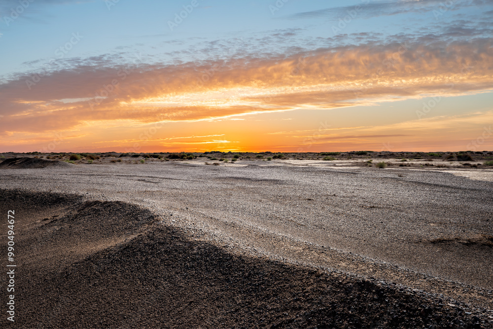 Gobi desert sand ground and sky clouds natural landscape at dusk. car advertising background. Gobi desert sand ground and sky clouds natural landscape at dusk. car advertising background.