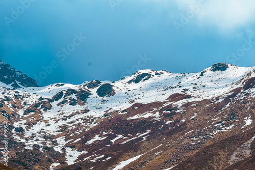 snow covered mountains in the may month in Himalayas. photo