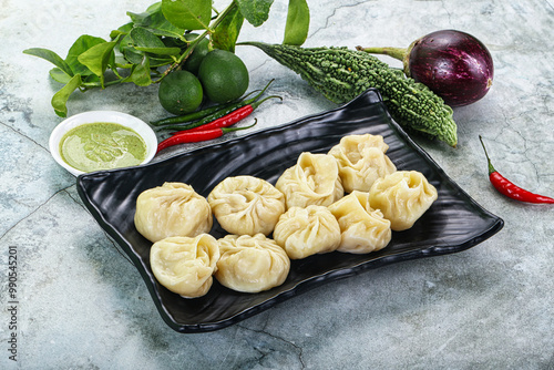 Nepali steamed dumplings Momo with sause