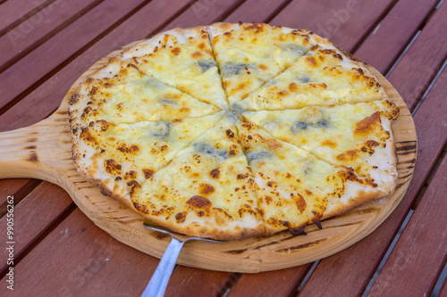 pizza on a wooden table