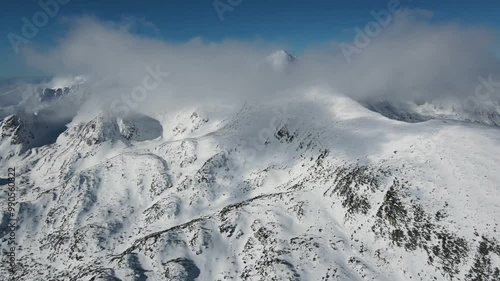 Amazing Aerial Winter view of Pirin Mountain near Polezhan and Bezbog Peaks, Bulgaria photo