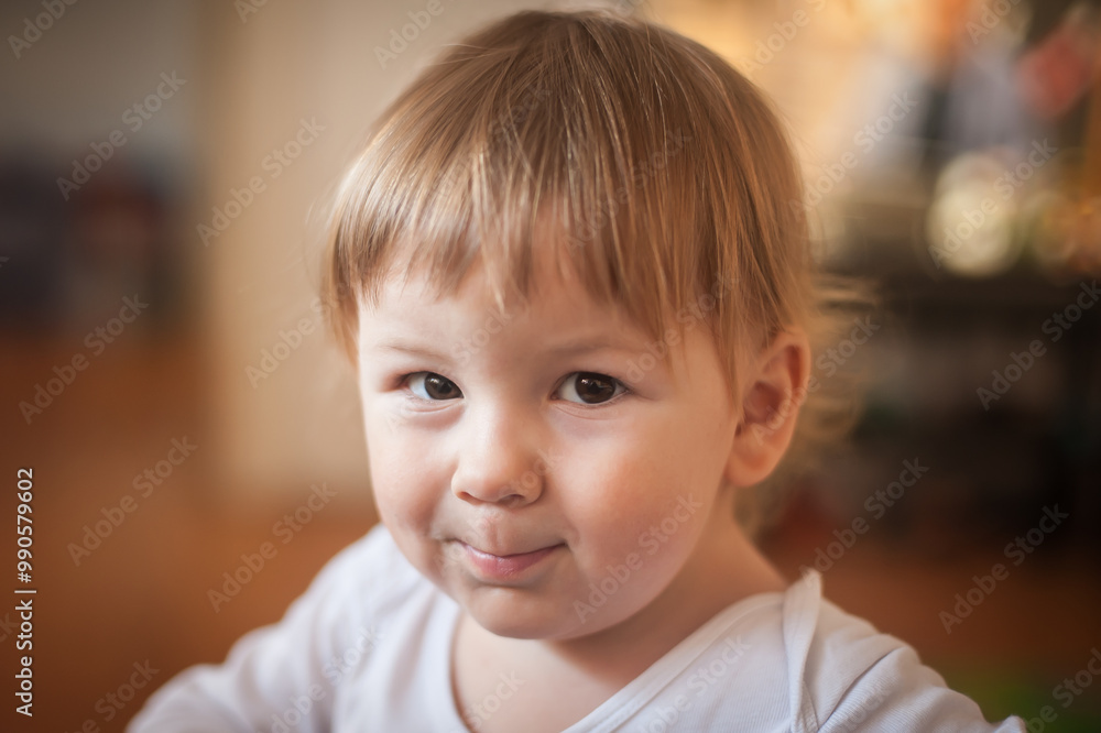 Curious toddler with a shy smile exploring a cozy indoor space filled with colorful toys and warm lighting Curious toddler with a shy smile exploring a cozy indoor space filled with colorful toys and warm lighting