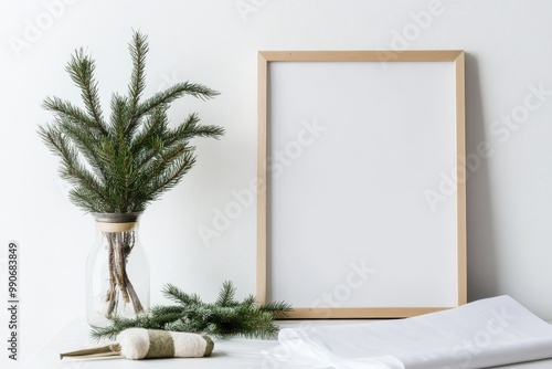 Minimalist Interior with Blank Frame and Holiday Wrapping Paper Mockup