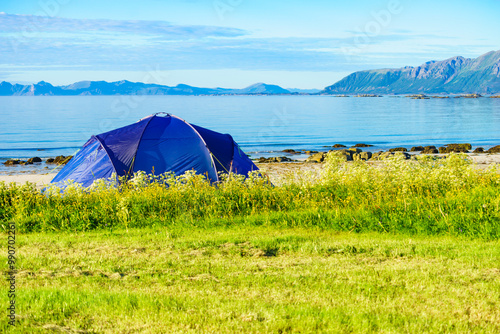 Tent on beach, Lofoten islands, Norway photo