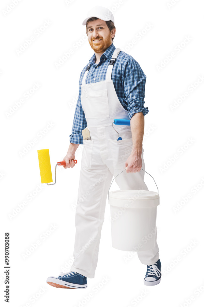 Confident house painter holding tools Confident house painter holding tools