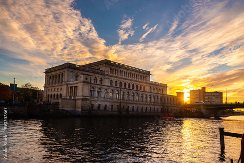 Building of Koenigsberg stock exchange on Pregola river at sunset. Kaliningrad. Russia photo