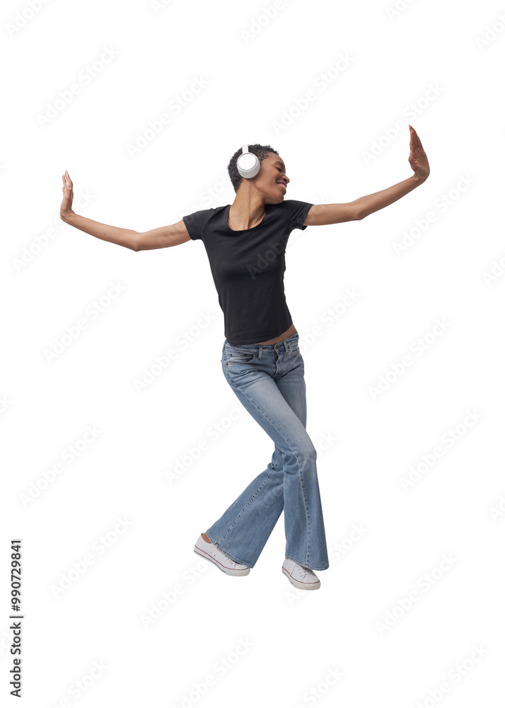 Beautiful fit woman wearing headphones and dancing Beautiful fit woman wearing headphones and dancing