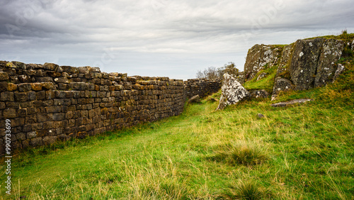 Hadrian's Wall below high crags at Walltown, a World Heritage Site in the beautiful Northumberland National Park. Popular with walkers along the Hadrian's Wall Path and Pennine Way photo